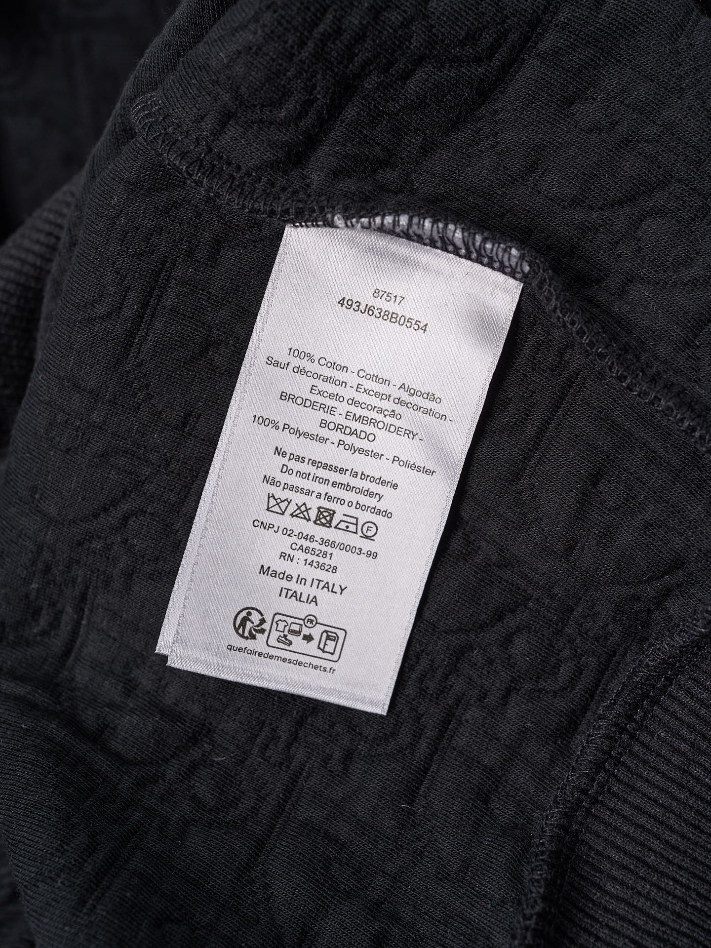 Black Dior hoodie interior care label on fabric tag