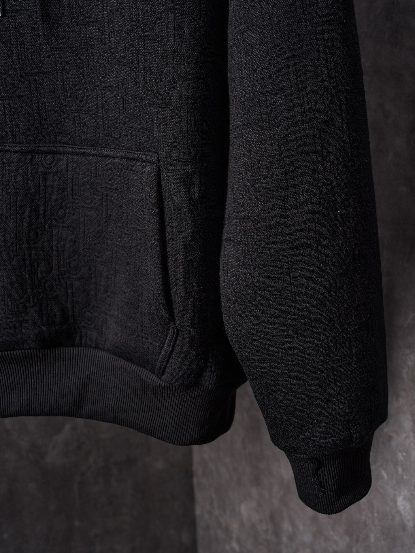 Black Dior hoodie kangaroo pocket with ribbed cuffs
