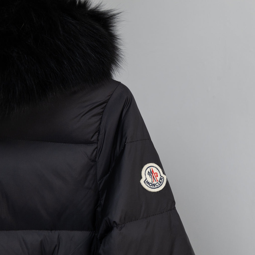 Moncler long puffer coat sleeve patch and dark puffer fabric