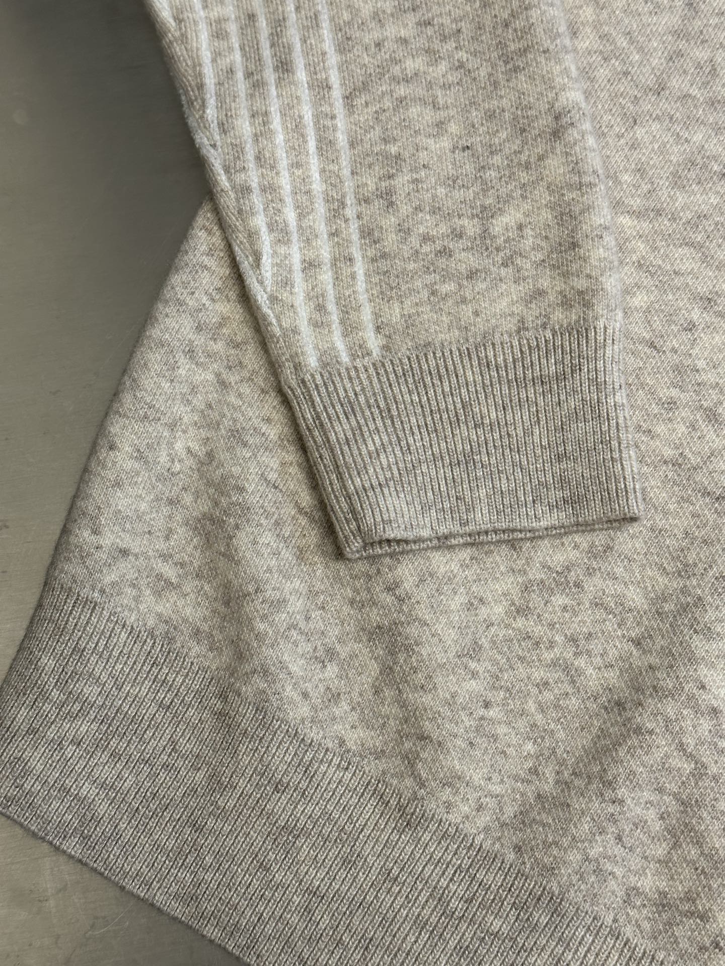 Louis Vuitton knit sweater cuff and hem with ribbed trim in taupe