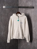 Off-white zip-up hoodie with hood, front pocket and Balenciaga chest logo