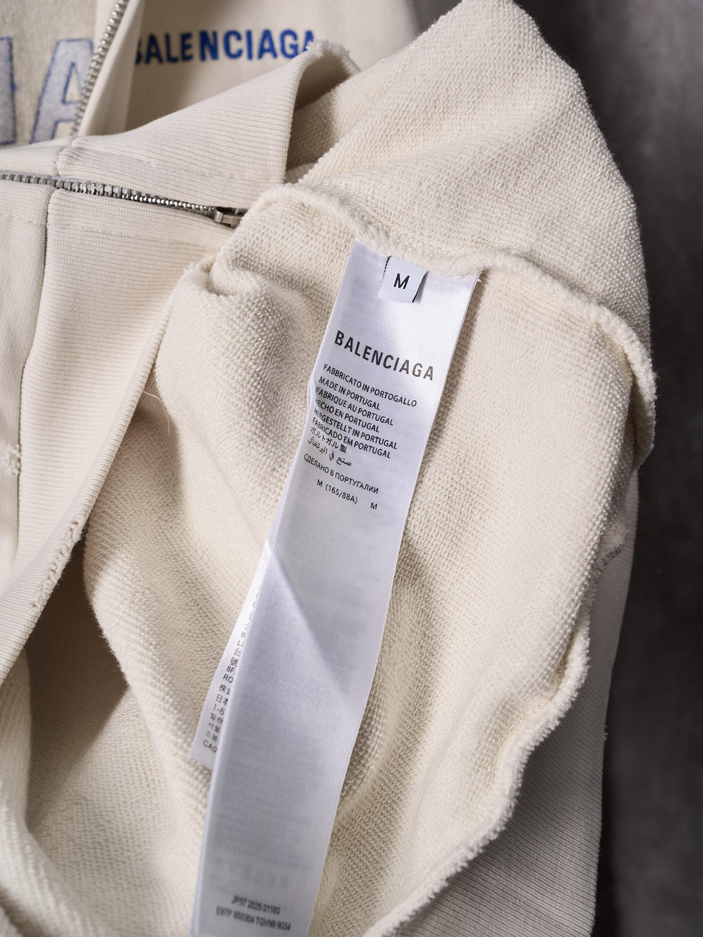 Balenciaga hoodie with internal neck label and off-white hood lining