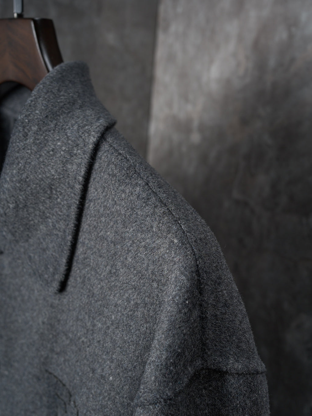 Fendi long coat shoulder and sleeve, dark gray textured wool