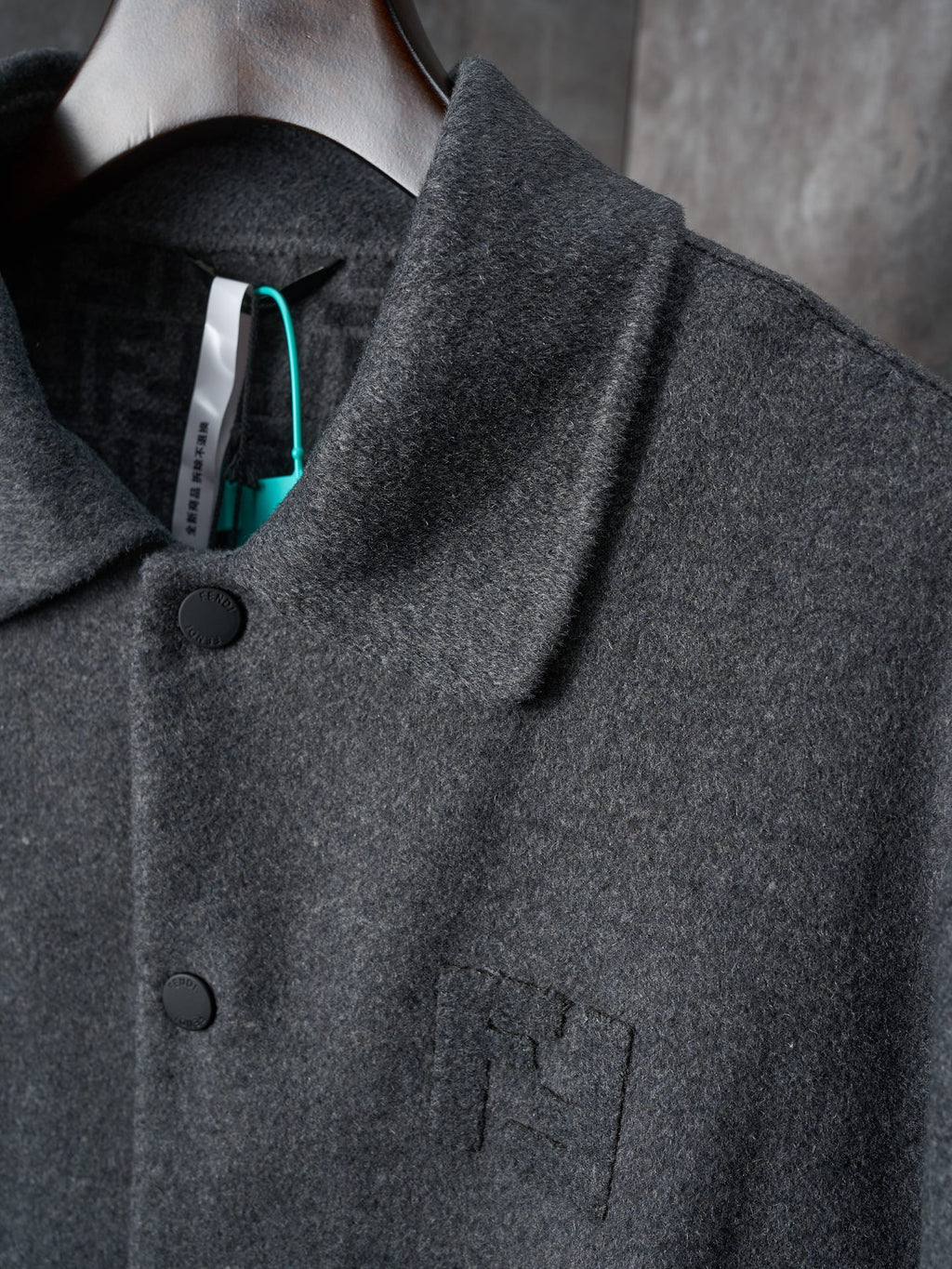 Fendi long coat detail, dark gray stand collar and button front