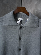 Burberry cardigan neckline, heather gray knit with button placket and collar detail