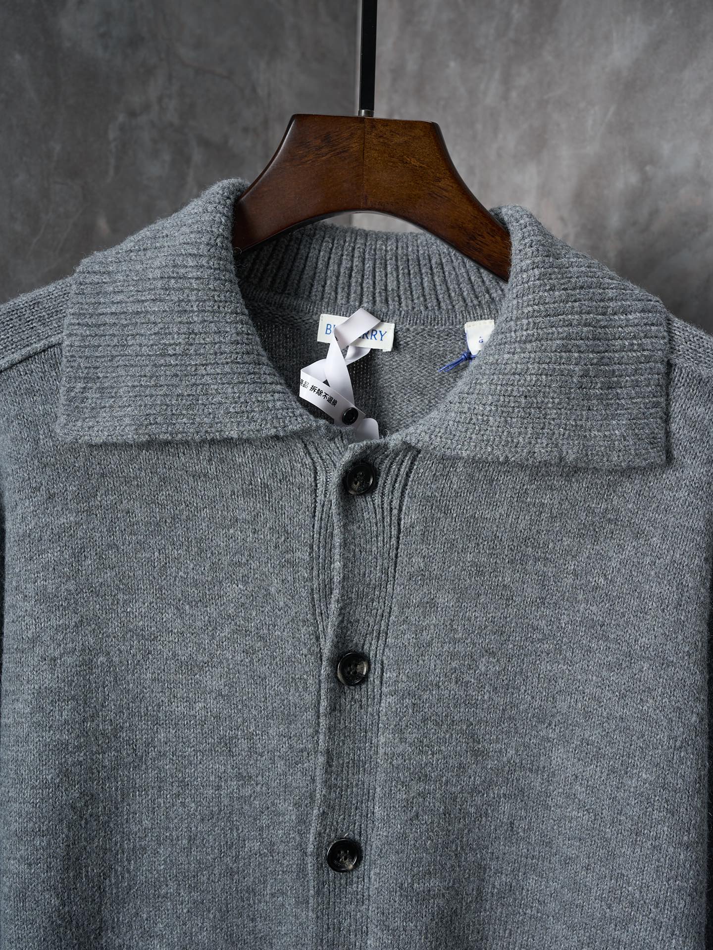 Burberry cardigan neckline, heather gray knit with button placket and collar detail