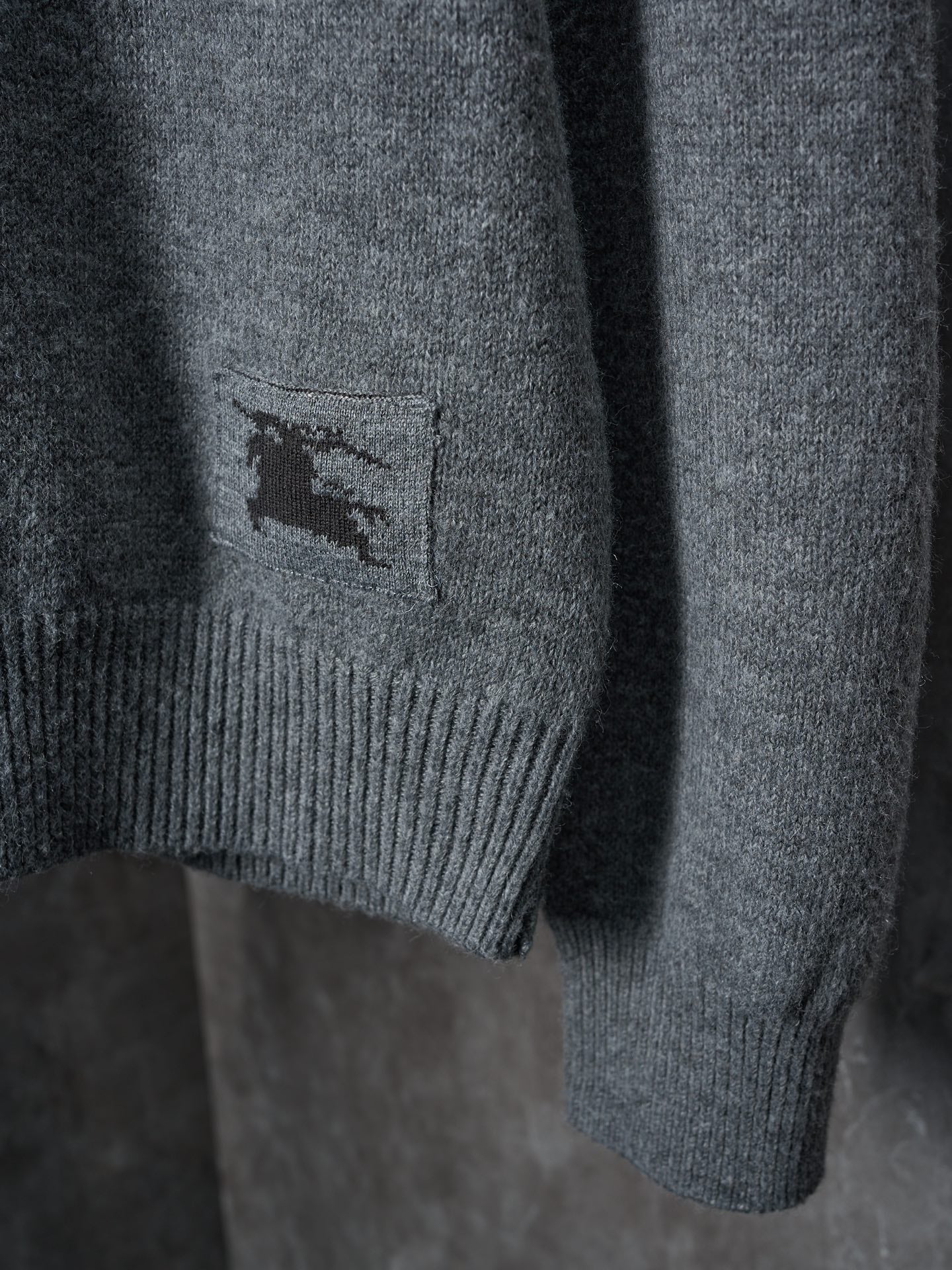 Burberry cardigan hem panel with embroidered horse logo on heather gray knit