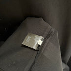 Balenciaga black T-shirt neckline tag and fabric seam detail