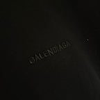 Balenciaga black T-shirt with raised Balenciaga logo on the chest