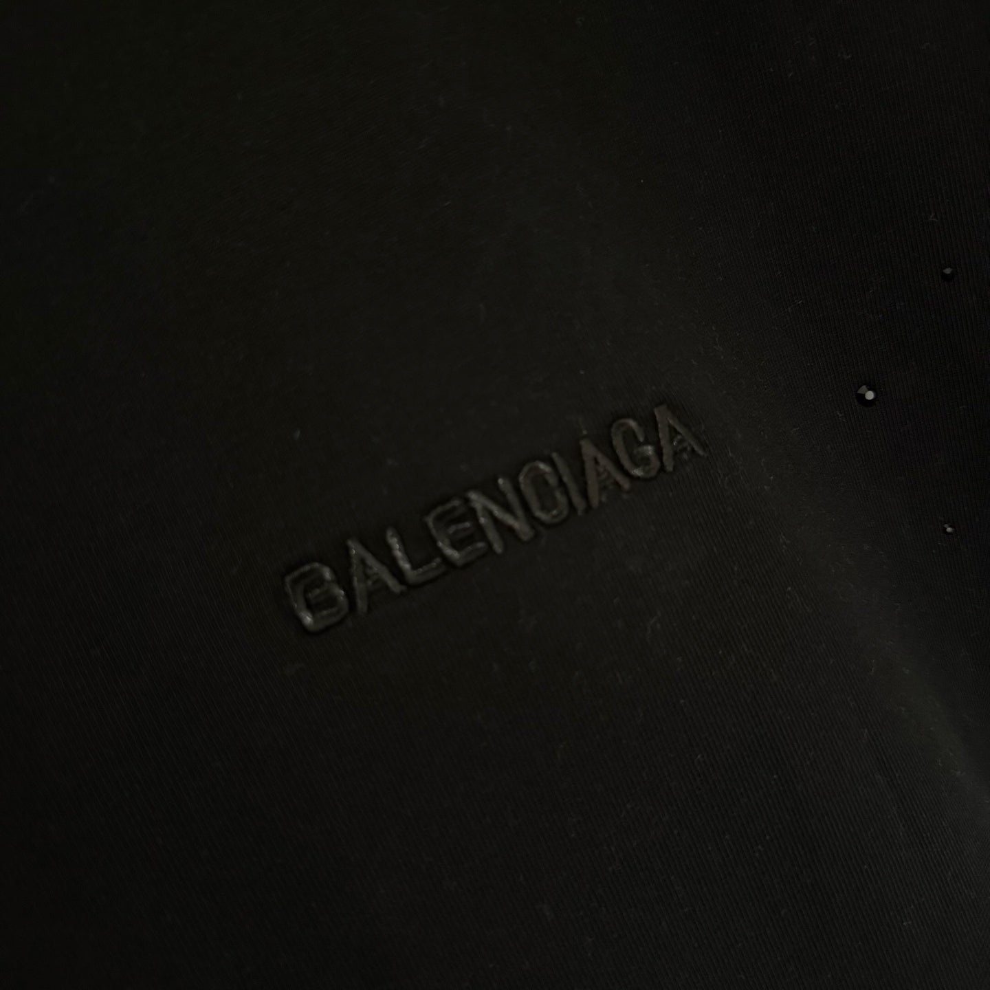 Balenciaga black T-shirt with raised Balenciaga logo on the chest