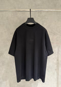 Balenciaga black crewneck T-shirt with small chest logo and scattered stud details