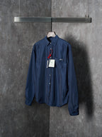 Navy Prada long-sleeve shirt with point collar and button front, product tags attached