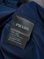 Prada fabric label inside navy shirt, printed size and product details