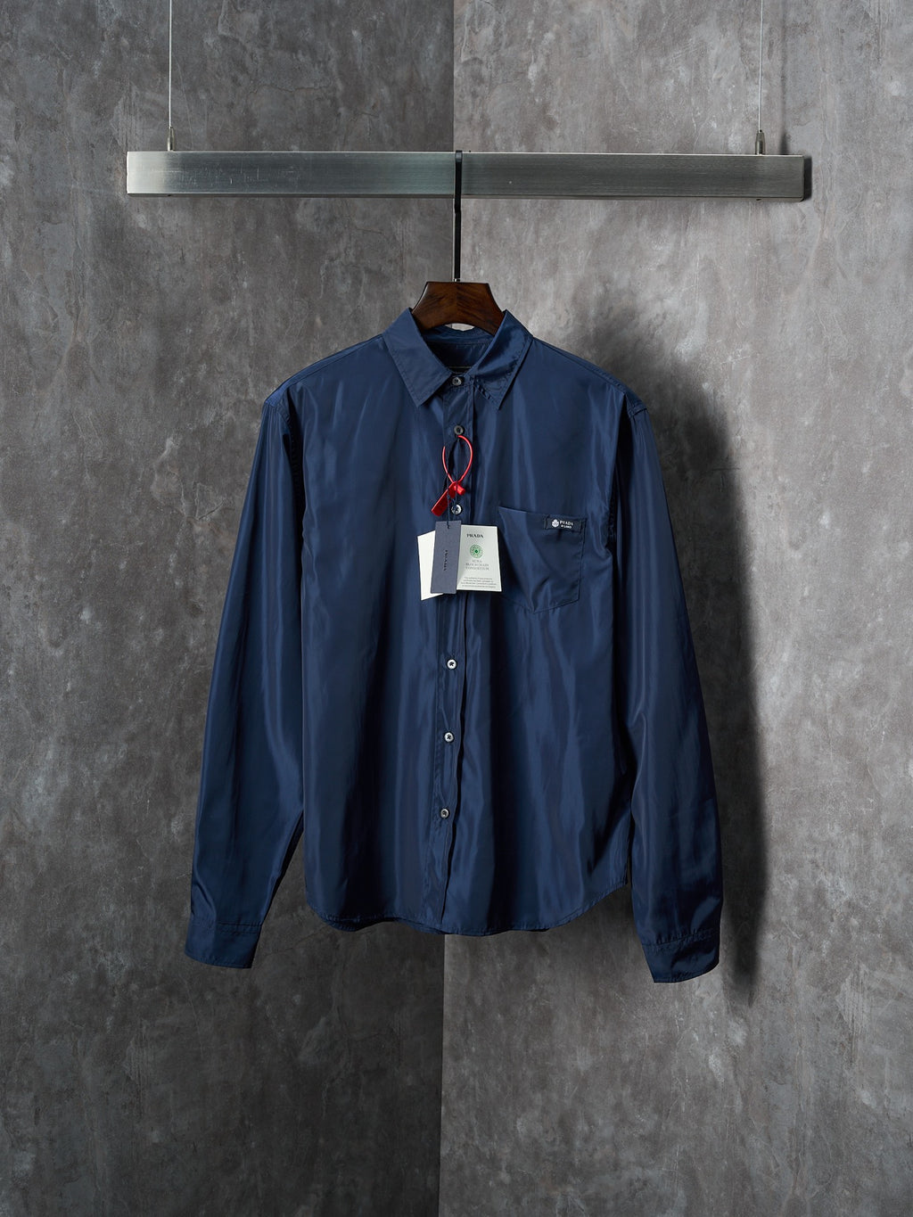 Navy Prada long-sleeve shirt with button front and point collar, hanging tag attached