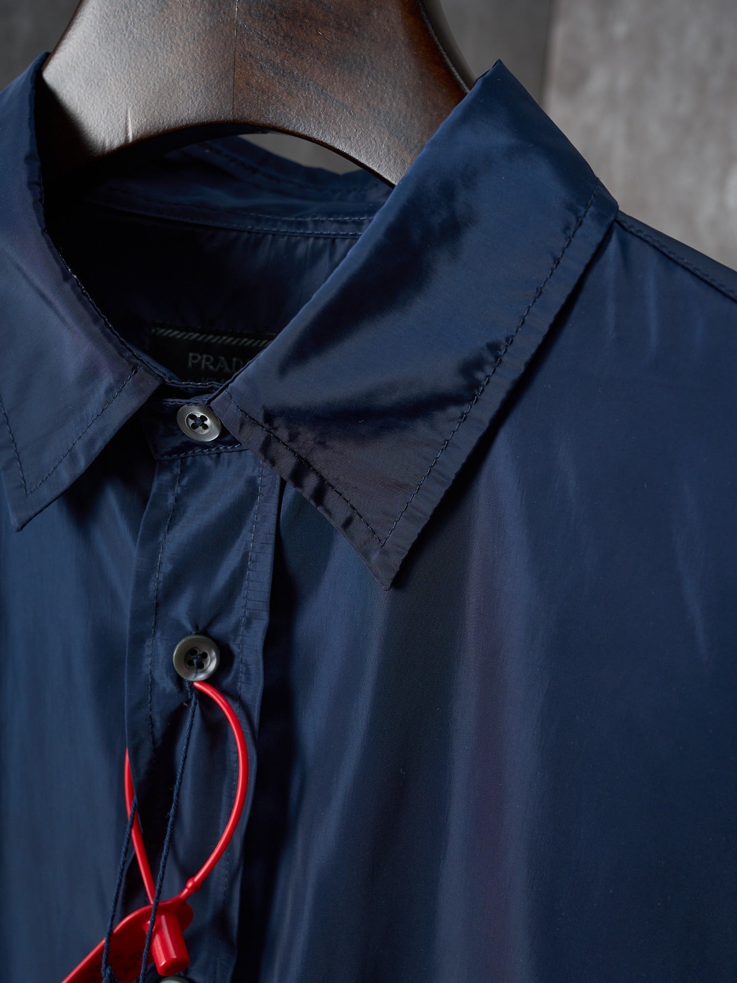Navy Prada shirt collar with snap button and keyhole placket, red cord detail