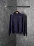 Long-sleeve knit sweater in dark navy with small multicolor animal logo embroidery