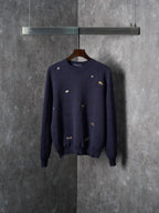 Long-sleeve knit sweater in dark navy with small multicolor animal logo embroidery