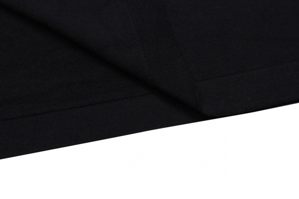Louis Vuitton black T-shirt fabric detail with stitched seam and fold