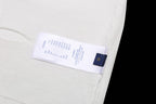 White Louis Vuitton T-shirt with care label inside