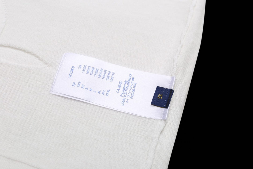 White Louis Vuitton T-shirt with care label inside