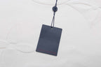 White Louis Vuitton T-shirt with blue hanging tag and crew neckline