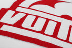 Louis Vuitton T-shirt close-up of red logo and white lettering