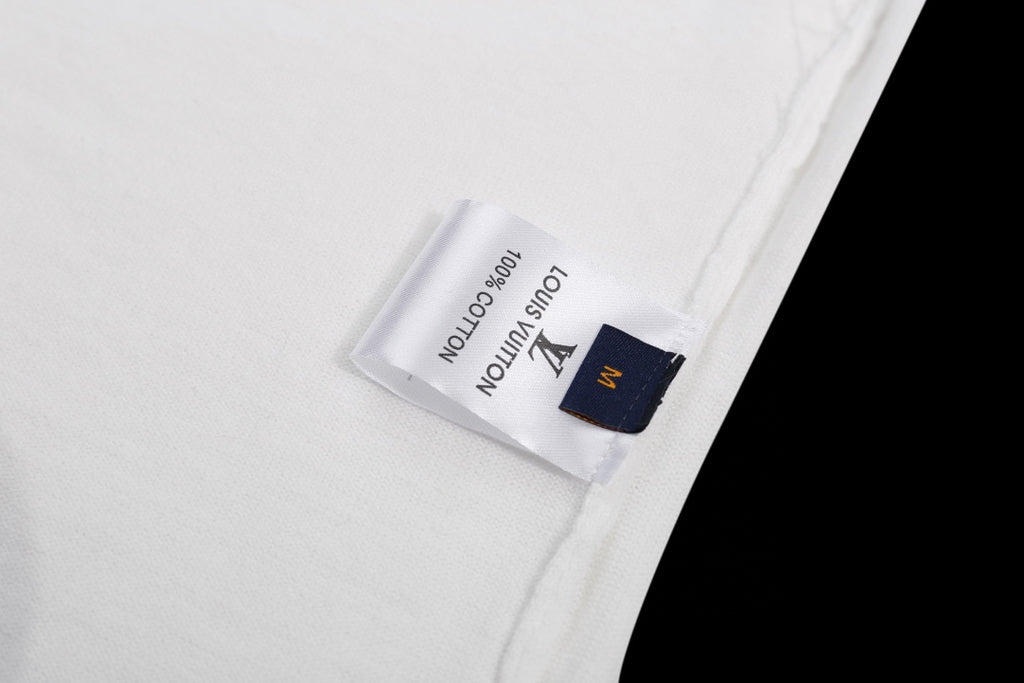 Louis Vuitton T-shirt with care label patch inside collar