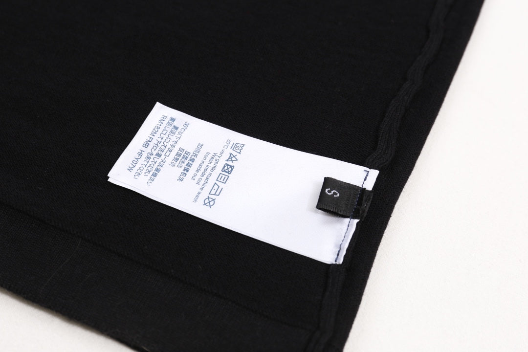 Black T-shirt interior label near side seam