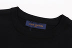 Black T-shirt neckline with brand tag at collar