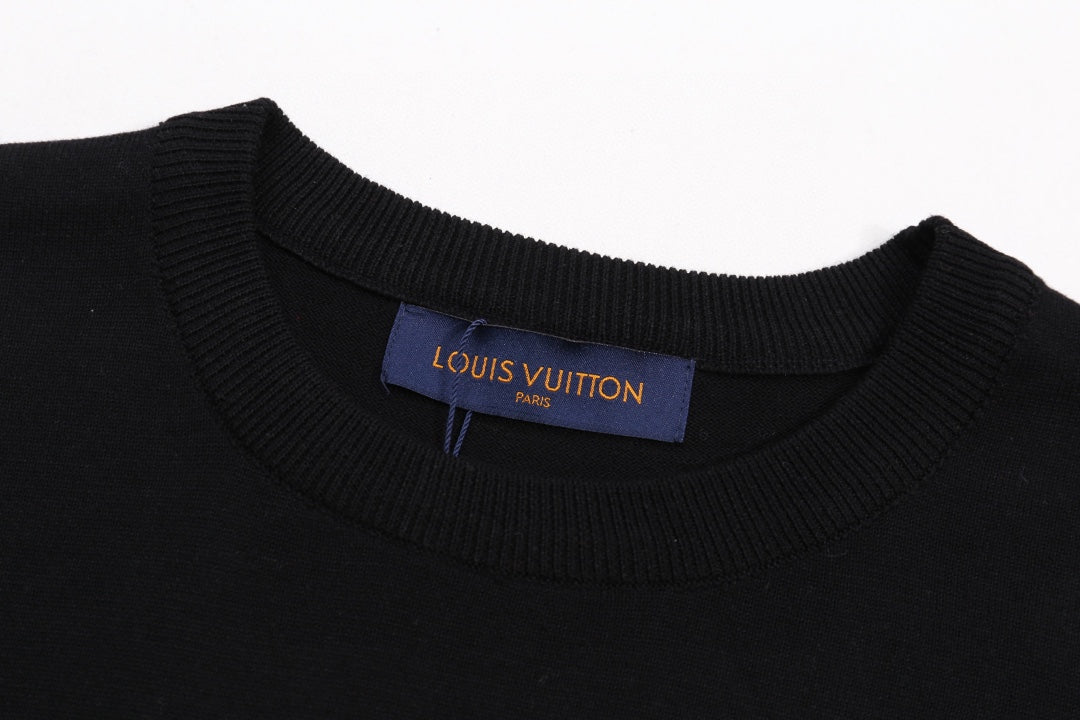 Black T-shirt neckline with brand tag at collar