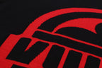 Black T-shirt with close-up of red logo lettering