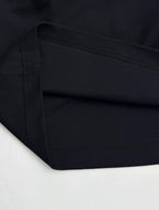 Fendi T-shirt fabric close-up with double-stitched hem in dark navy