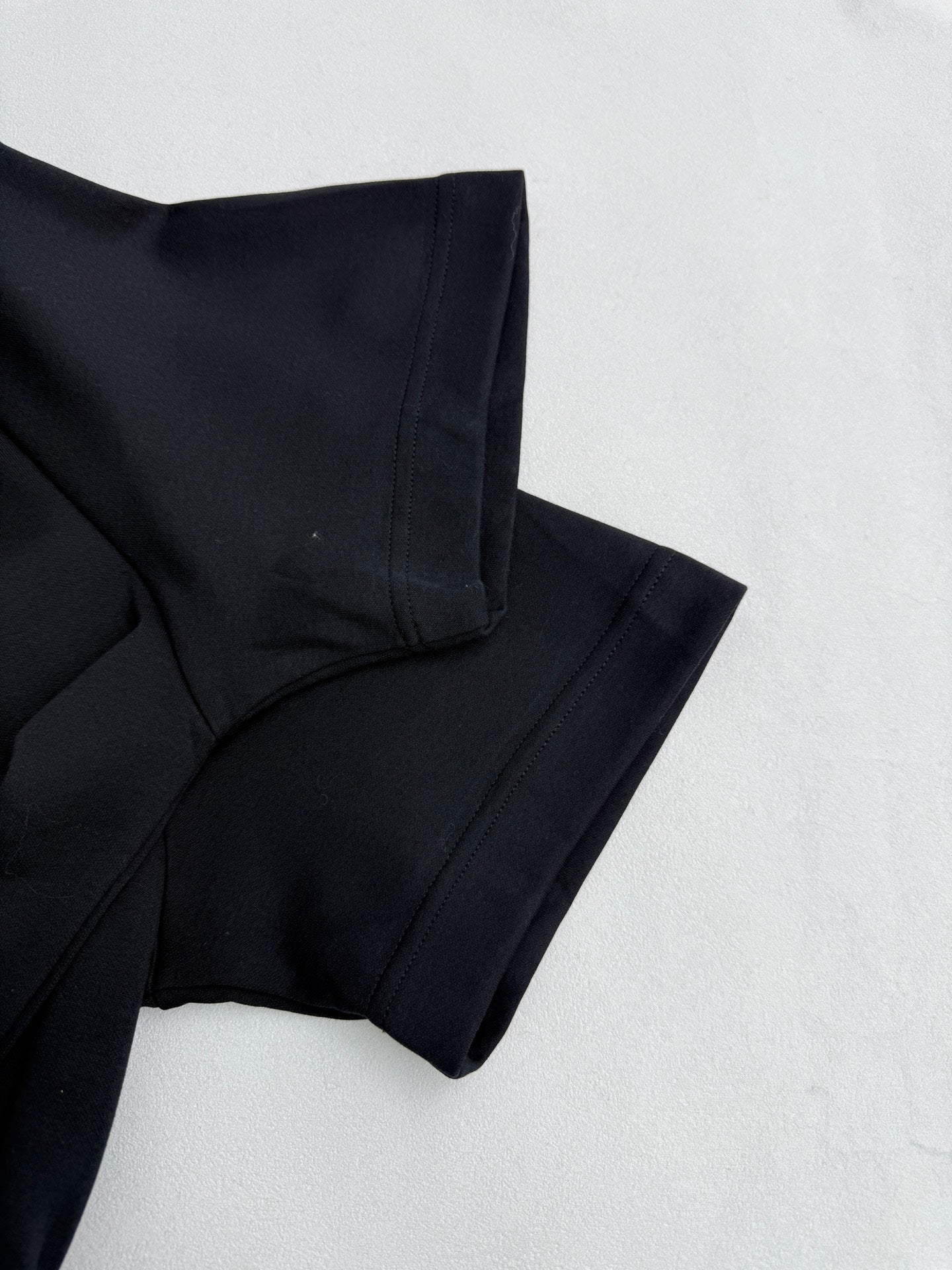 Fendi T-shirt sleeve and shoulder seam in dark navy, crew-neck style