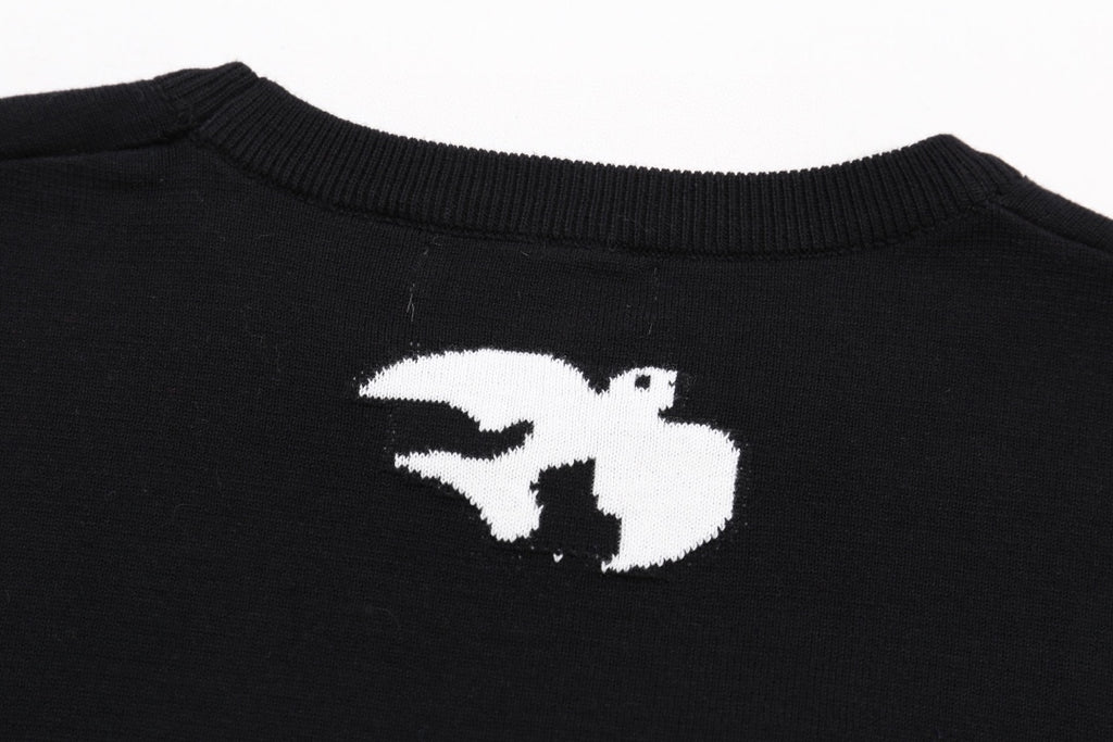 Louis Vuitton black T-shirt close-up of white animal logo on back
