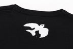 Louis Vuitton black T-shirt close-up of white animal logo on back