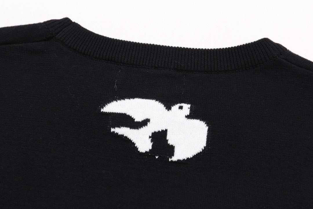 Louis Vuitton black T-shirt close-up of white animal logo on back
