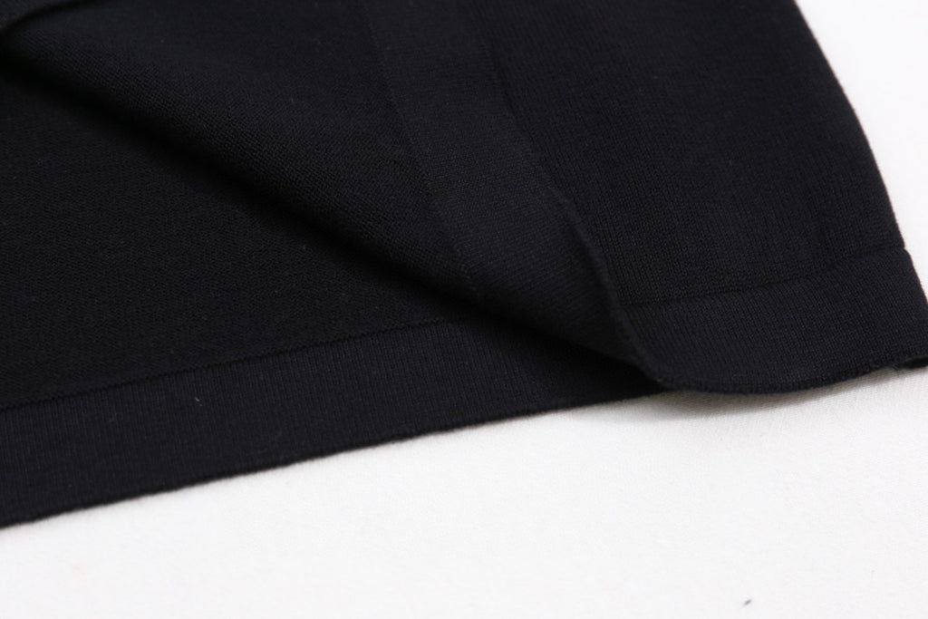 Louis Vuitton black T-shirt sleeve and curved hem seam detail