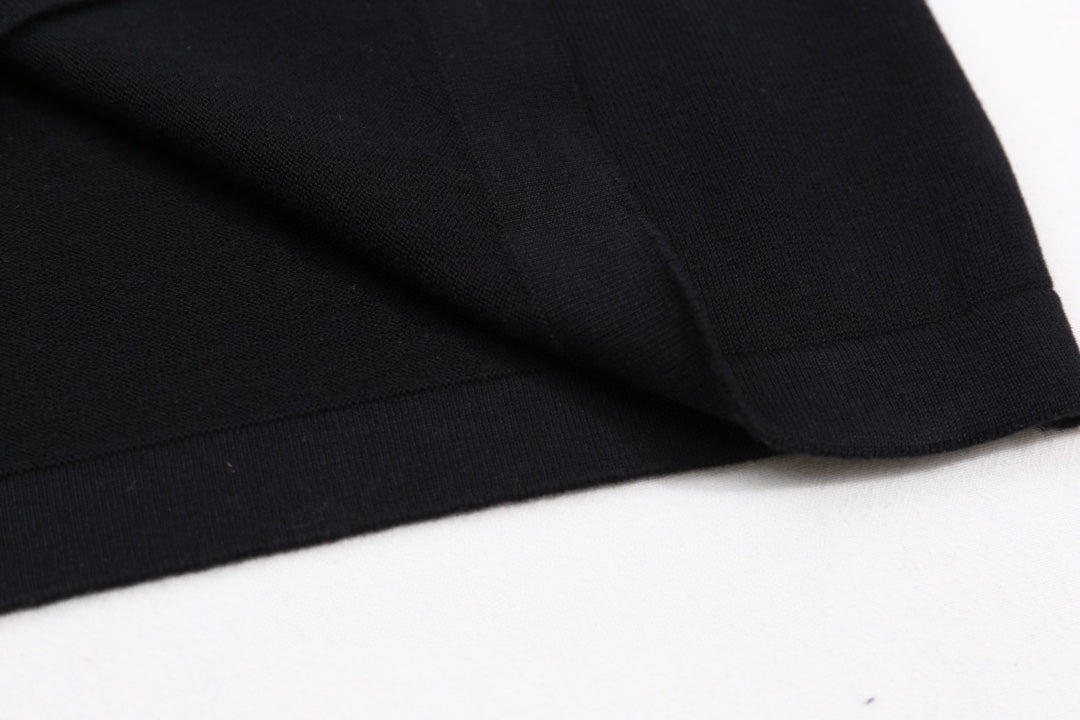 Louis Vuitton black T-shirt sleeve and curved hem seam detail