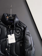 Moncler long puffer jacket, black with front logo patch and hangtag