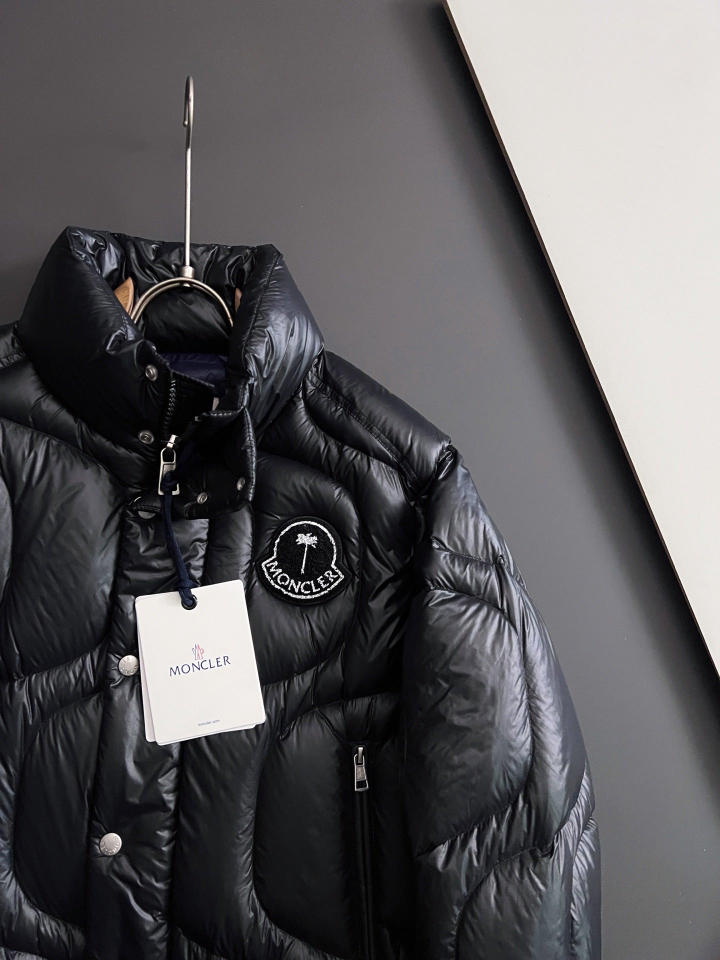 Moncler long puffer jacket, black with front logo patch and hangtag
