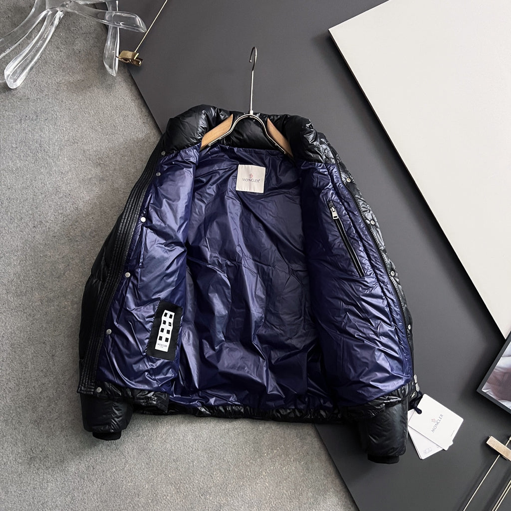 Moncler long puffer jacket, black with visible blue interior lining