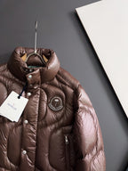 Moncler long puffer jacket in dark brown, quilted front, hood opening, hang tag