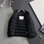 Prada long black puffer jacket open view with quilted lining and interior tag