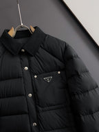 Prada long black puffer jacket collar and triangle logo patch on chest