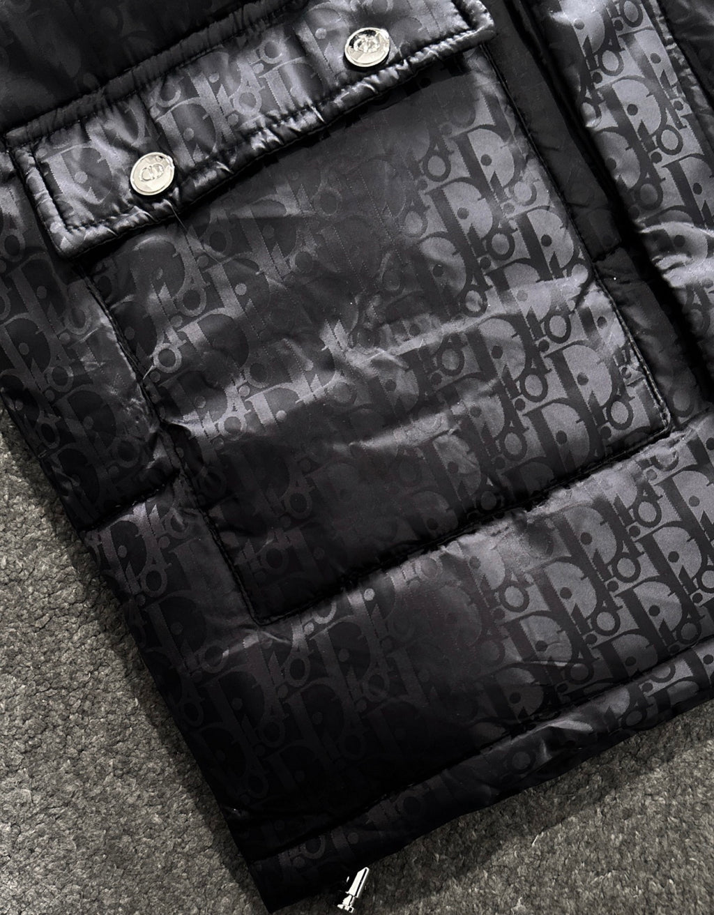 Black puffer jacket quilted interior with Dior monogram fabric and snap placket