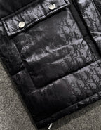 Black puffer jacket quilted interior with Dior monogram fabric and snap placket