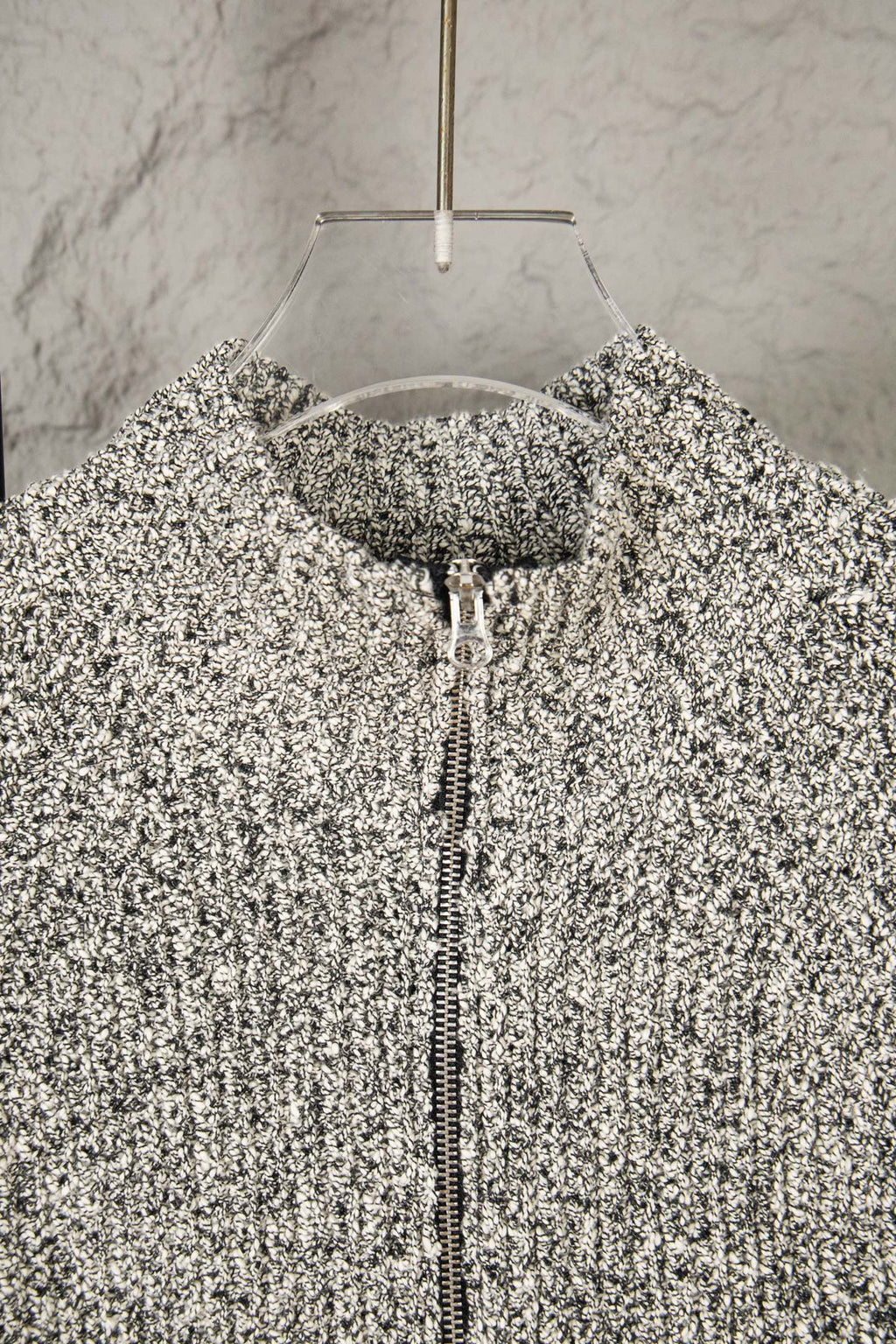Speckled textured jacket top with stand collar and visible full zipper