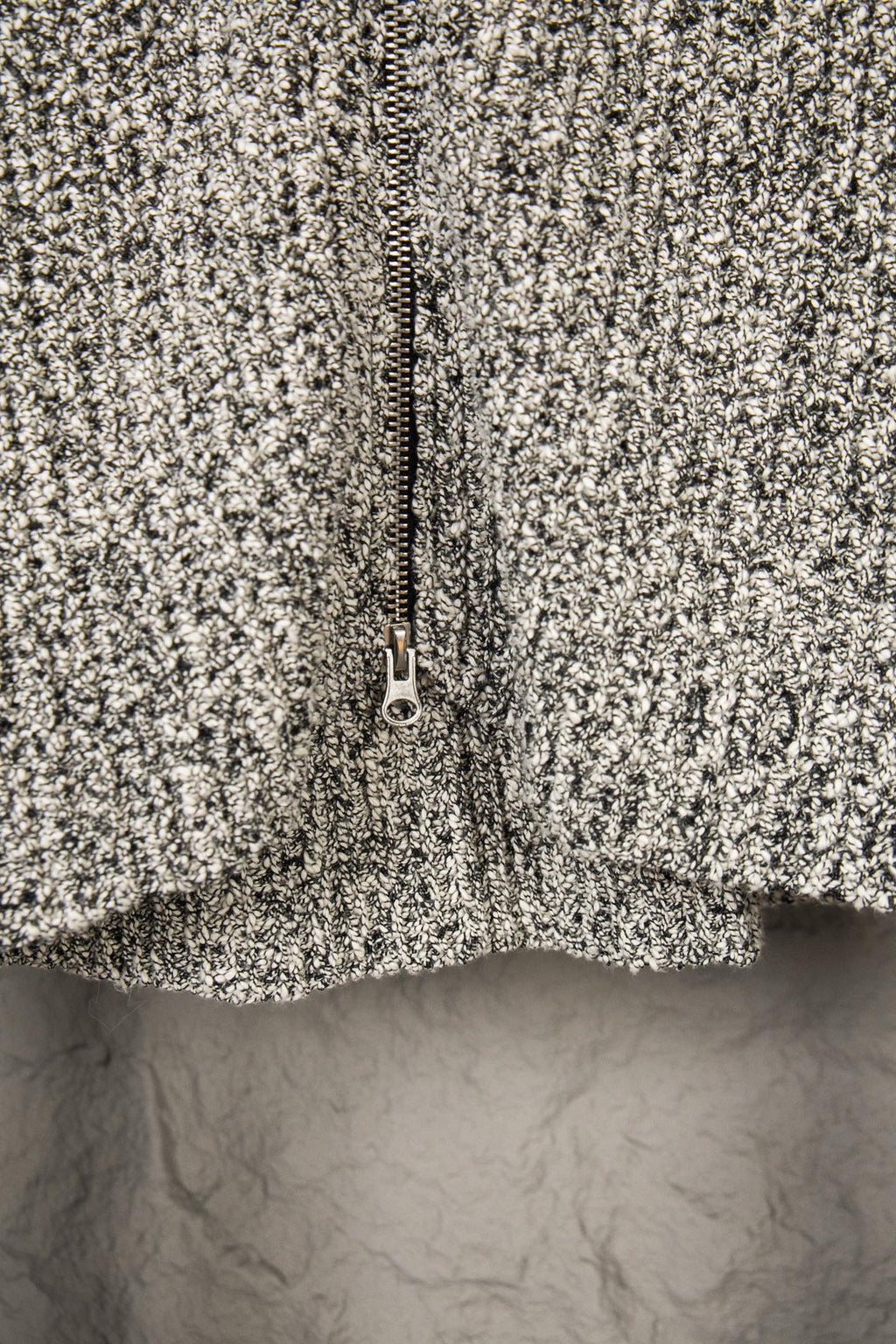 Stone Island flecked jacket close-up, full zipper and textured knit surface