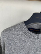 Grey crewneck knit sweater collar and ribbed knit cuffs