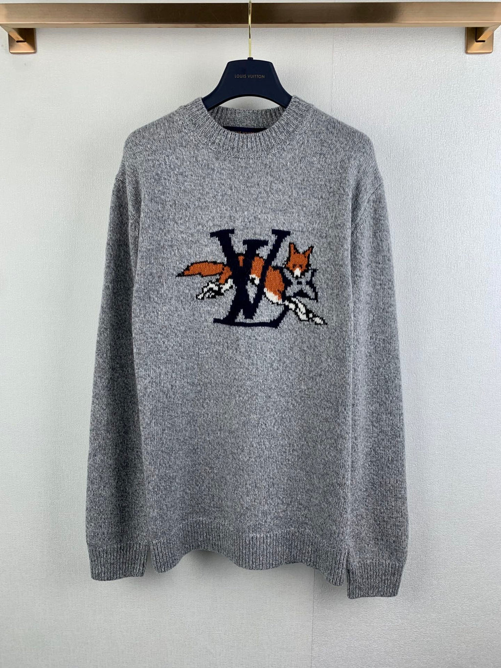 Grey long-sleeve knit sweater with large LV-style front graphic